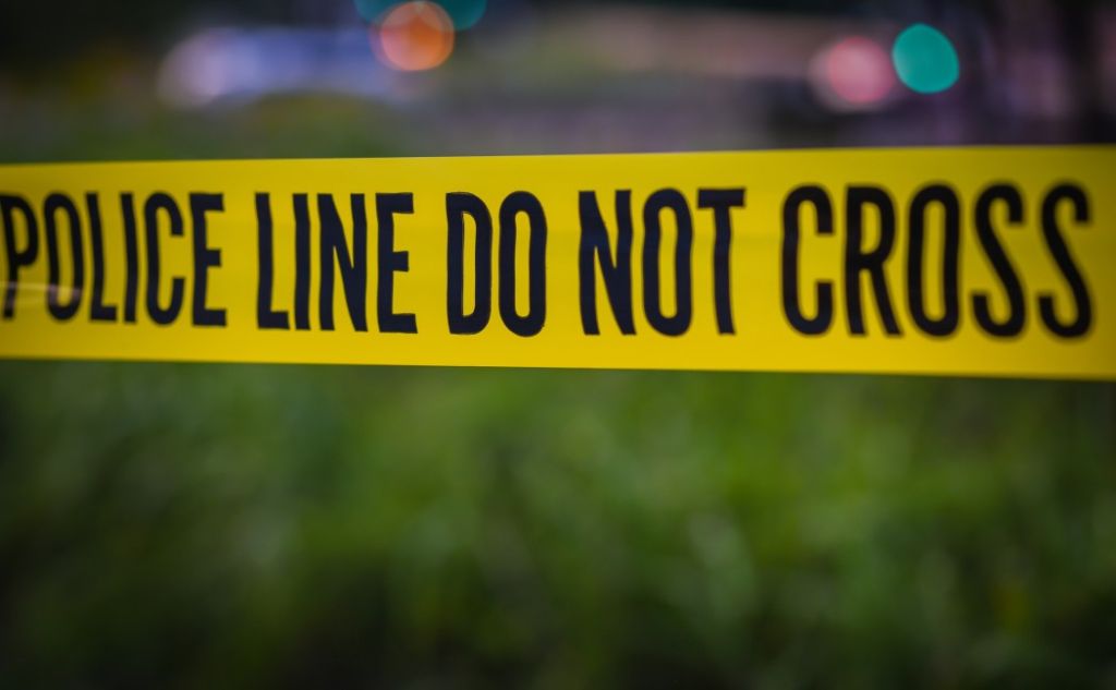 Police barrier tape at crime scene