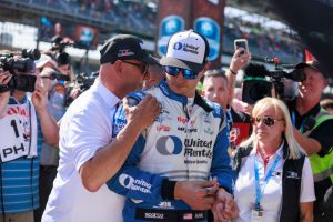 Graham Rahal is consoled by his father Bobby Rahal.