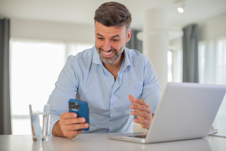 Mid adult man working from home