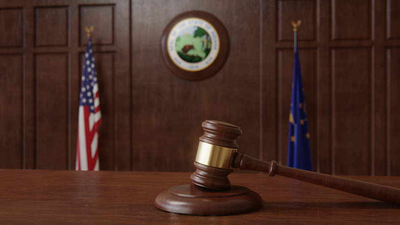 Courtroom scene with US flag and state seal and flag of the state of Indiana. 3d rendering