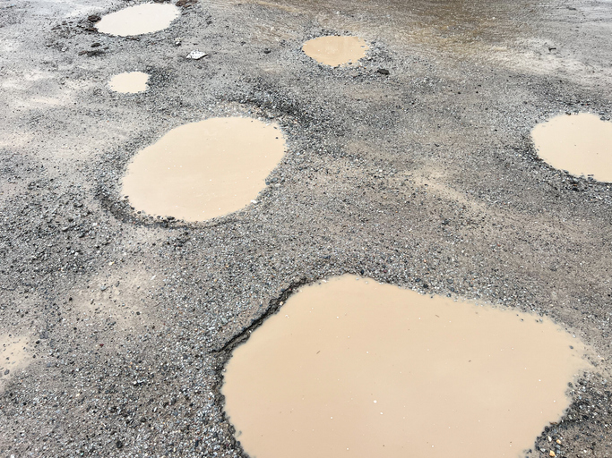 Rural roads are bumpy, waterlogged, and damaged.