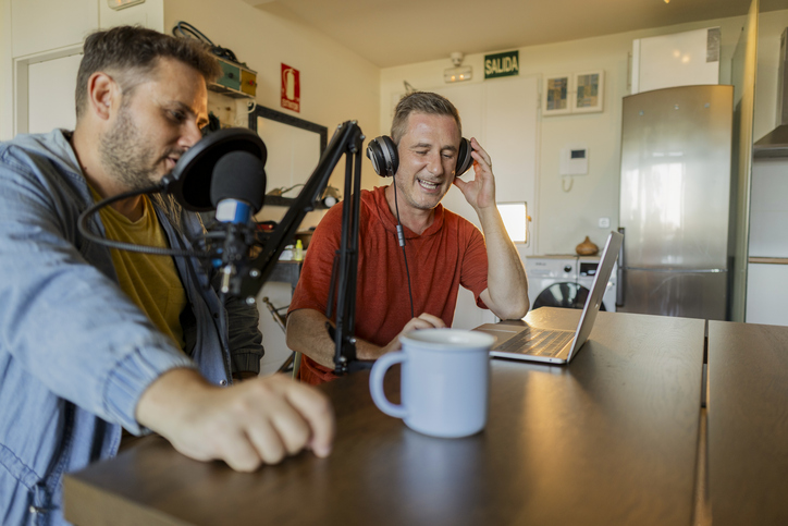Couple Recording a Podcast in a Home Studio