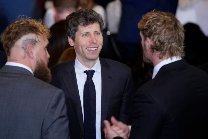Sam Altman, chief executive officer of OpenAI Inc., center, with boxer Jake Paul and wrestler Logan Paul arrives prior to the inauguration