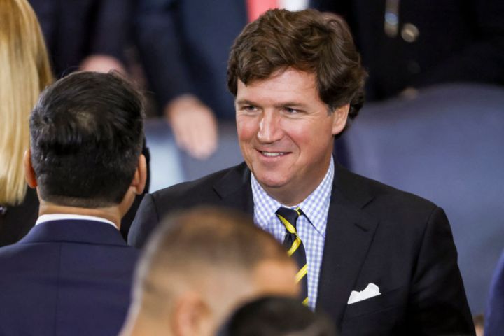 Political commentator Tucker Carlson attends the inauguration ceremony.