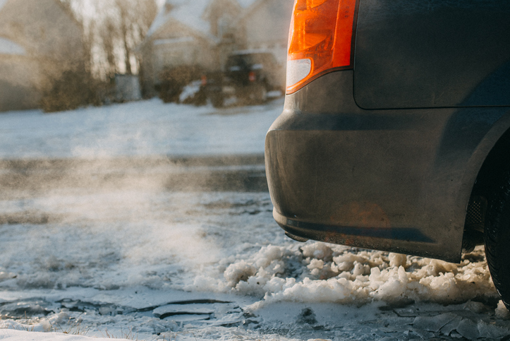 White smoke Coming Out From a Car Muffler