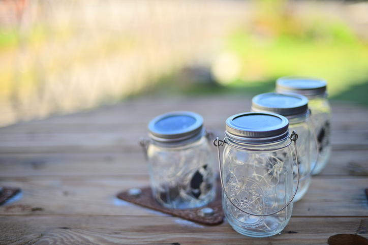 Early Morning: Solar Ball Mason Jars on Wooden Table