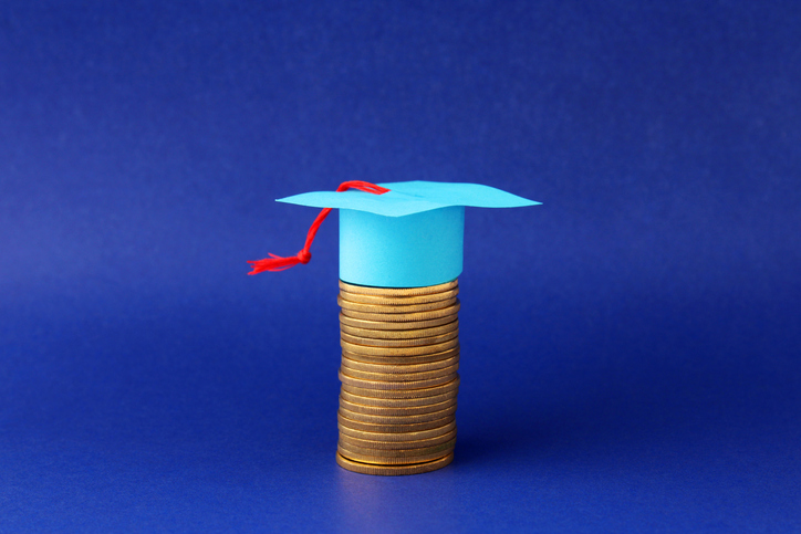 Graduate cap on gold coins
