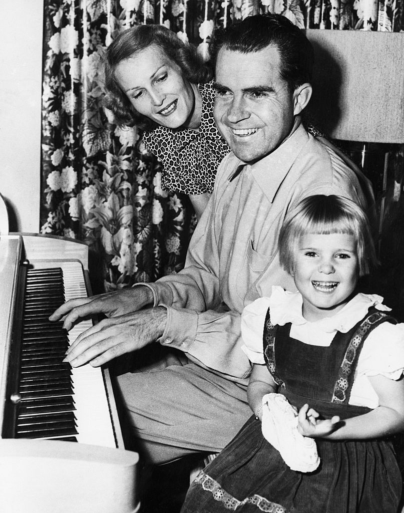 Richard Nixon with Daughter and Wife at Piano