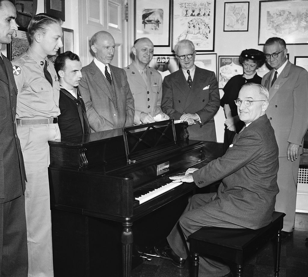 Group Watching President Truman Play a Piano