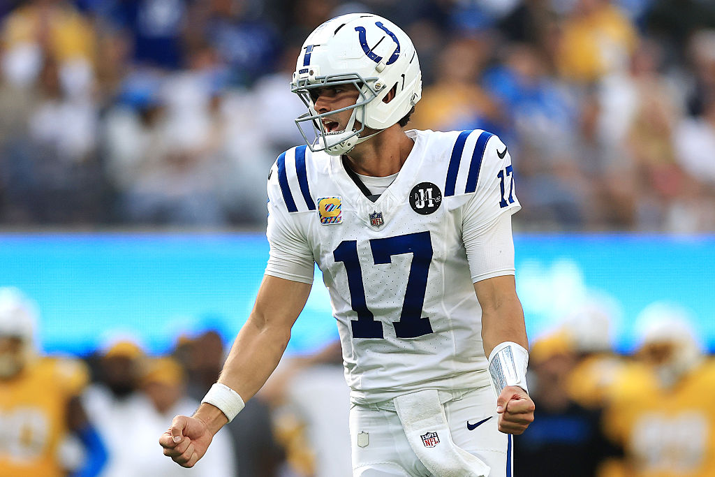 Daniel Jones celebrates after one of his team's touchdowns